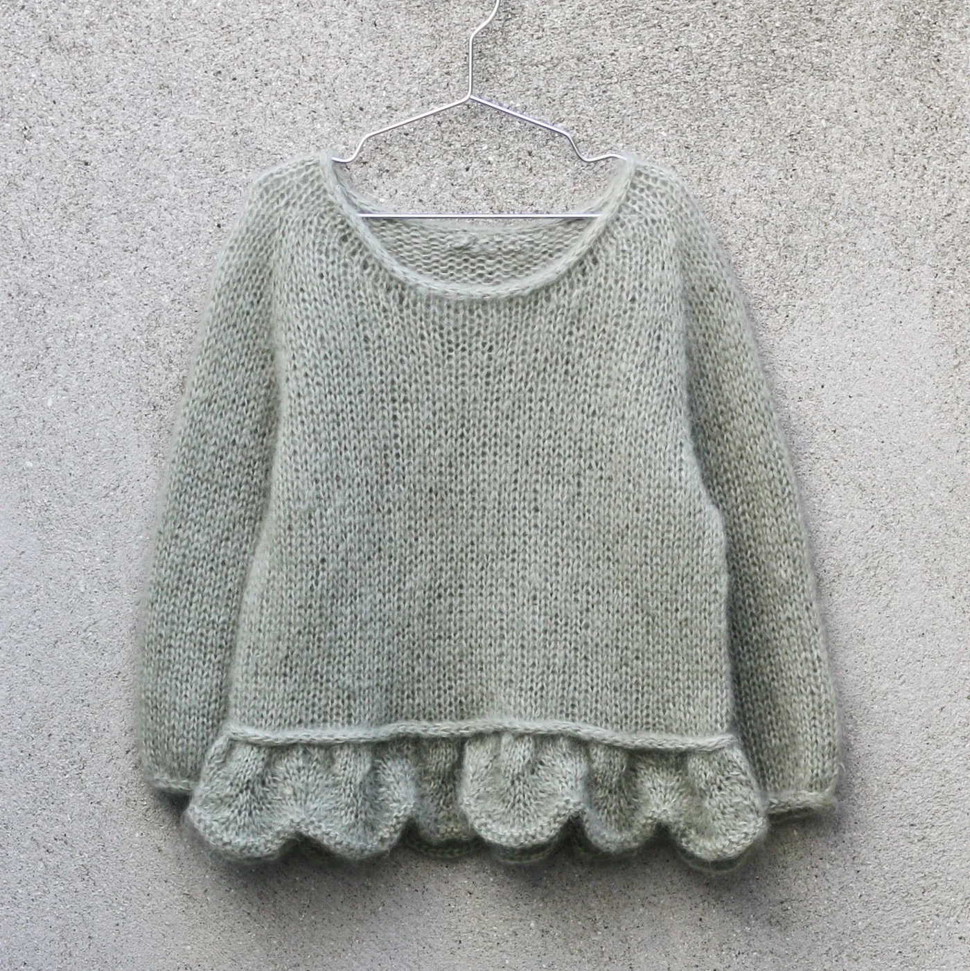 KfO Modèle Poppy Sweater (en allemand)